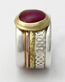 Five band 'Stacking Ring Single-stone' in silver and gold with Ruby cabochon